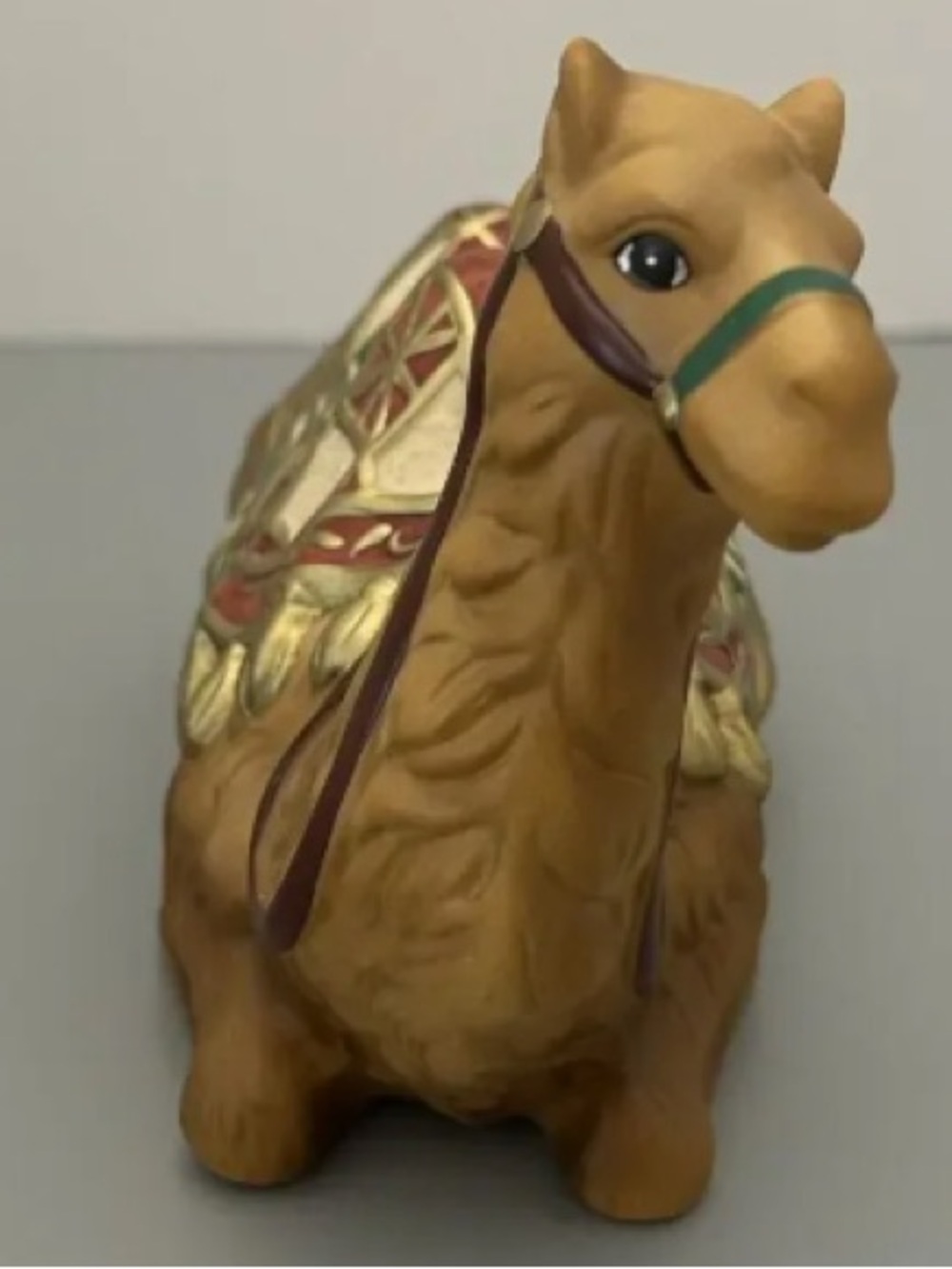 Decorative Tan Camel Figurine Pillow Accent with Gold and Green Trim